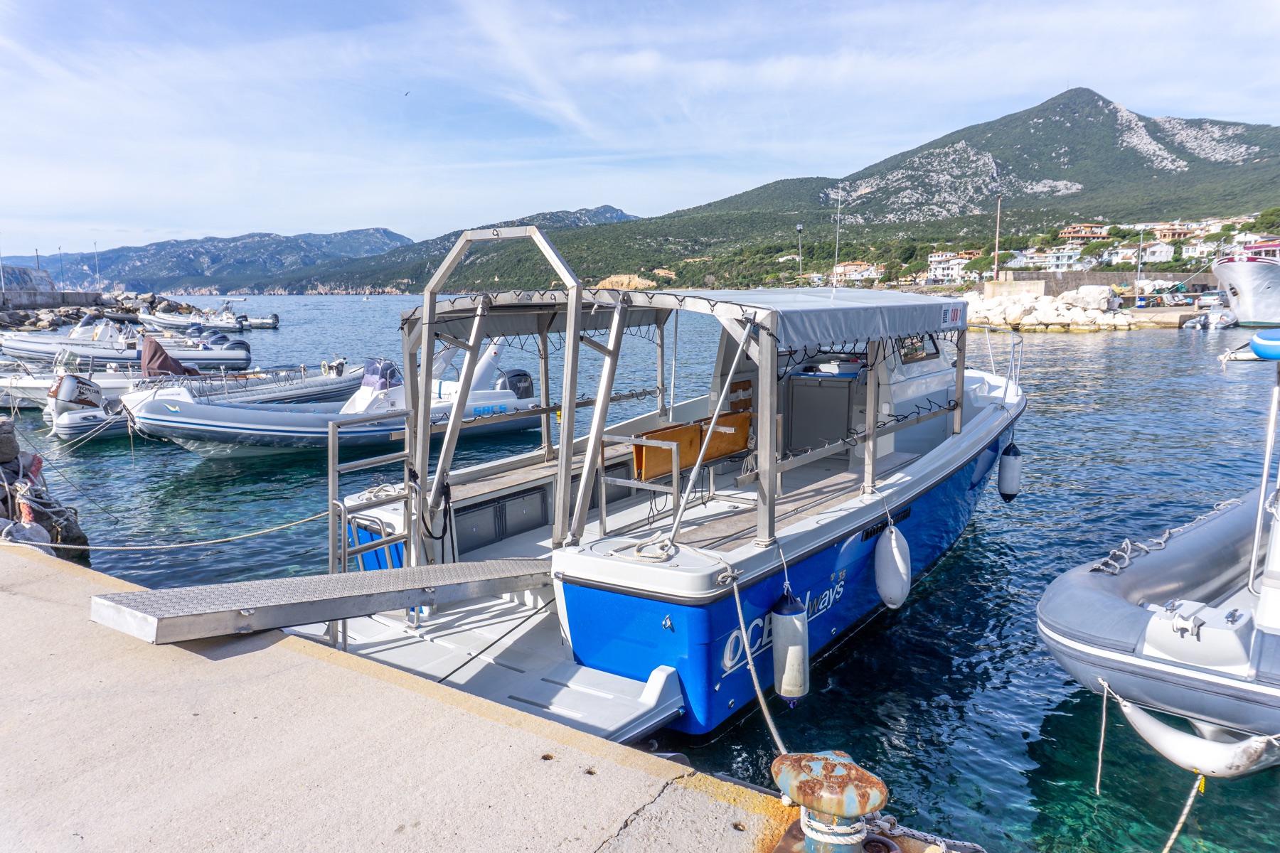 Base One dive boat at Cala Gonone marina