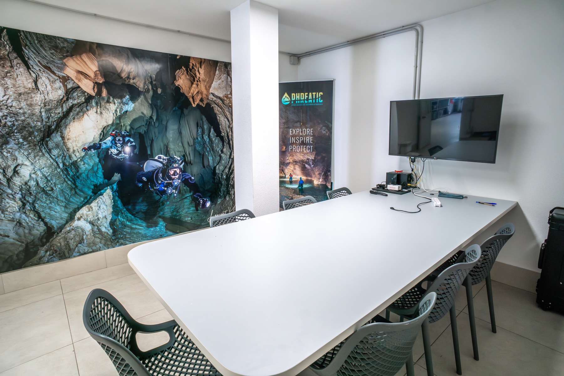 Briefing room with cave-diving mural