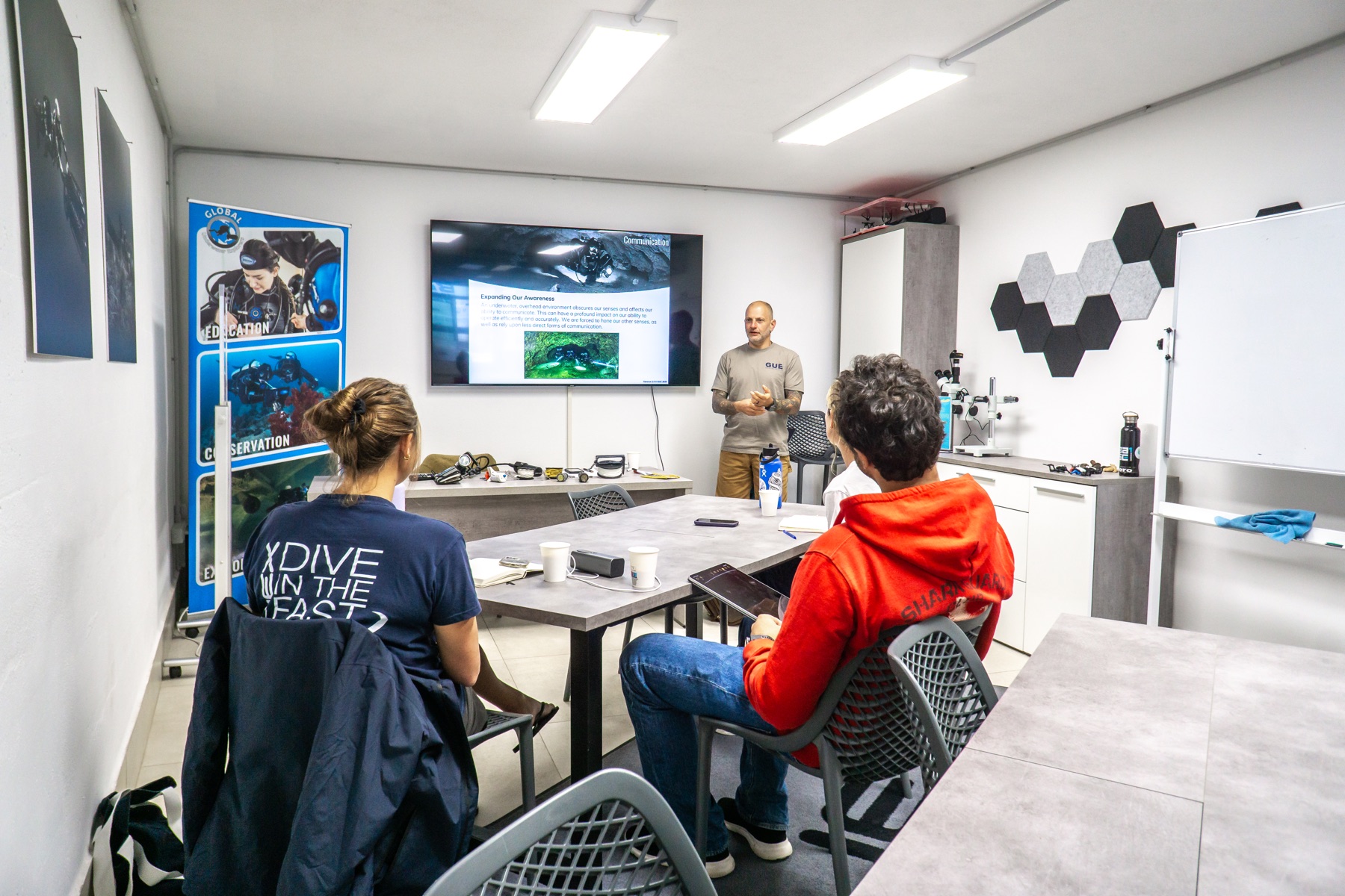 Instructor leading a theory session in the classroom